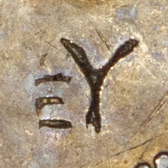 A combination of 三 - *san* - three and 丫 - *yā* - bifurcation, fork